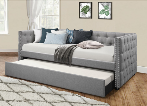 Tufted grey twin daybed with twin trundle