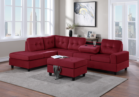 Red velvet reversible tufted sectional with drop down cup holders and storage ottoman