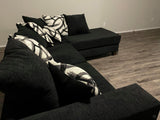 Black Sectional includes throw pillows