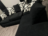 Black Sectional includes throw pillows