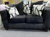 Black sofa and love seat with decorative pillows- new