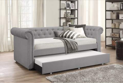 Grey twin daybed with twin trundle and nailhead design