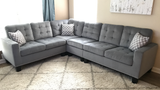 Grey Tufted Sectional with Nail Head Trim